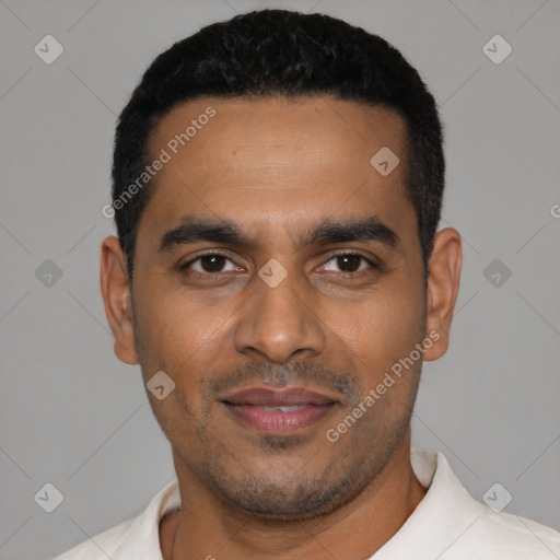 Joyful latino young-adult male with short  black hair and brown eyes