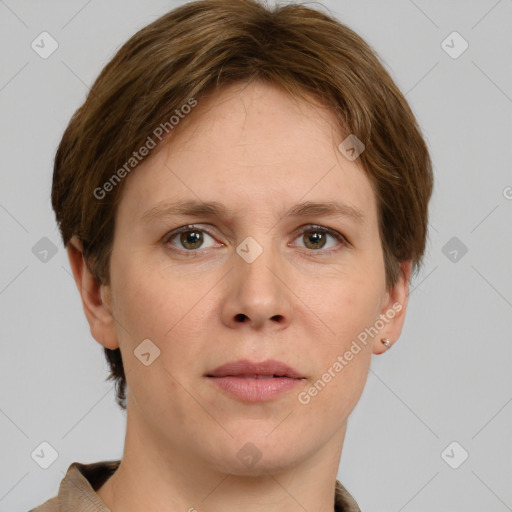 Joyful white young-adult female with short  brown hair and grey eyes