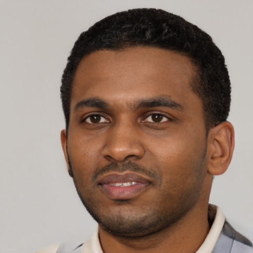 Neutral black young-adult male with short  black hair and brown eyes