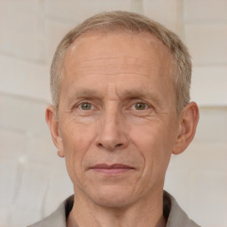 Joyful white middle-aged male with short  brown hair and brown eyes