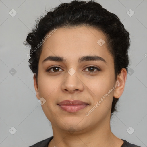 Joyful latino young-adult female with short  brown hair and brown eyes