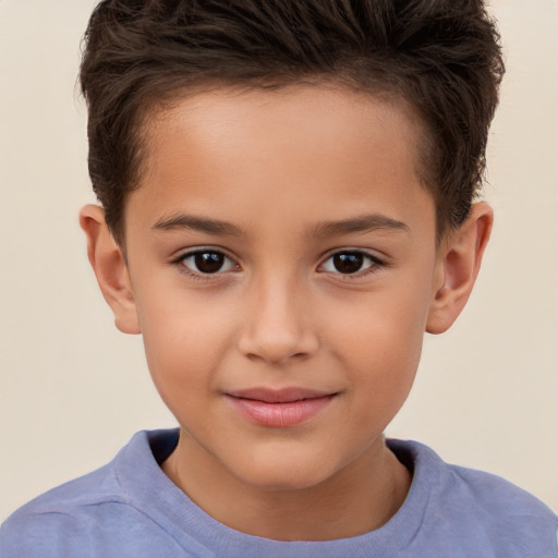 Joyful white child male with short  brown hair and brown eyes