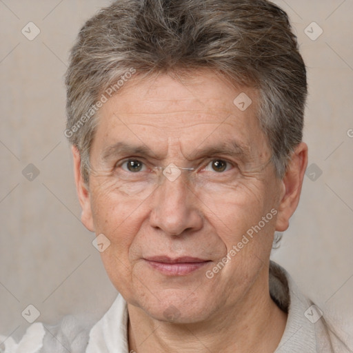 Joyful white middle-aged male with short  brown hair and brown eyes