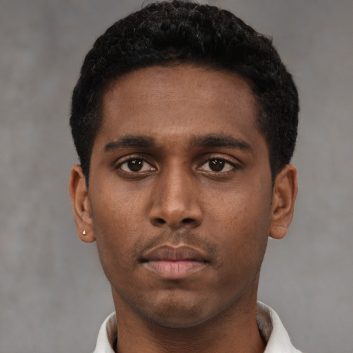 Neutral black young-adult male with short  brown hair and brown eyes