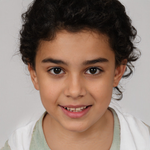 Joyful white child female with medium  brown hair and brown eyes