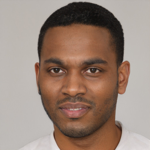 Neutral black young-adult male with short  black hair and brown eyes