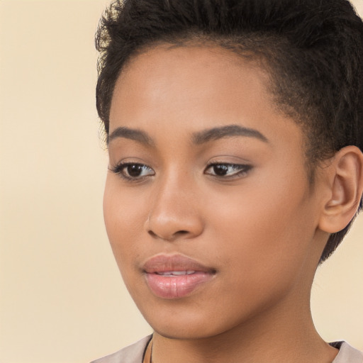 Joyful latino young-adult female with short  brown hair and brown eyes