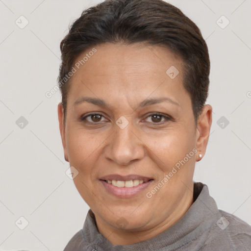 Joyful white adult female with short  brown hair and brown eyes