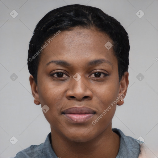 Joyful black young-adult female with short  black hair and brown eyes