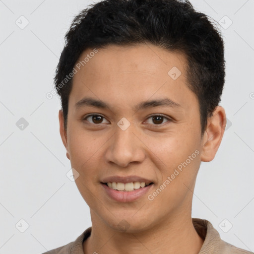 Joyful latino young-adult male with short  brown hair and brown eyes