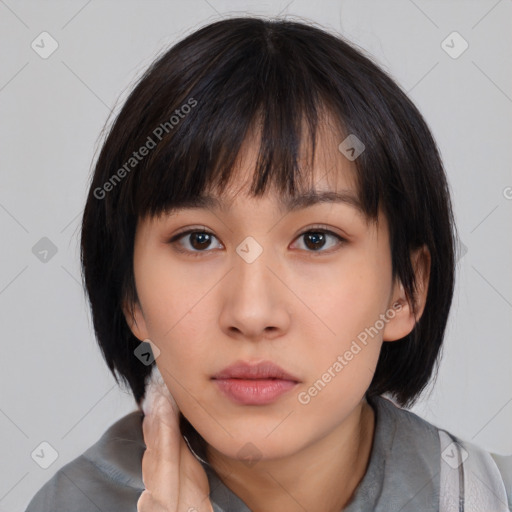 Neutral asian young-adult female with medium  black hair and brown eyes