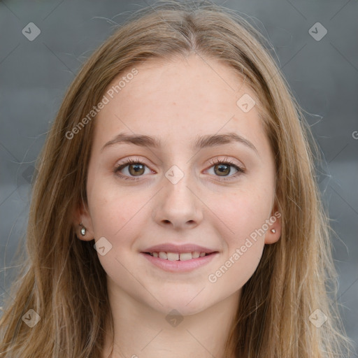 Joyful white young-adult female with long  brown hair and blue eyes