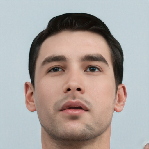 Neutral white young-adult male with short  black hair and brown eyes