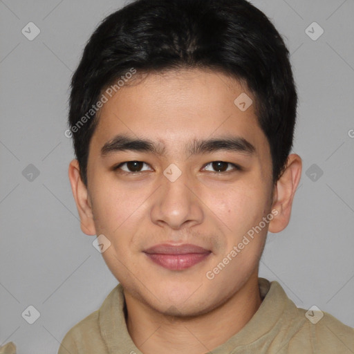Joyful asian young-adult male with short  brown hair and brown eyes
