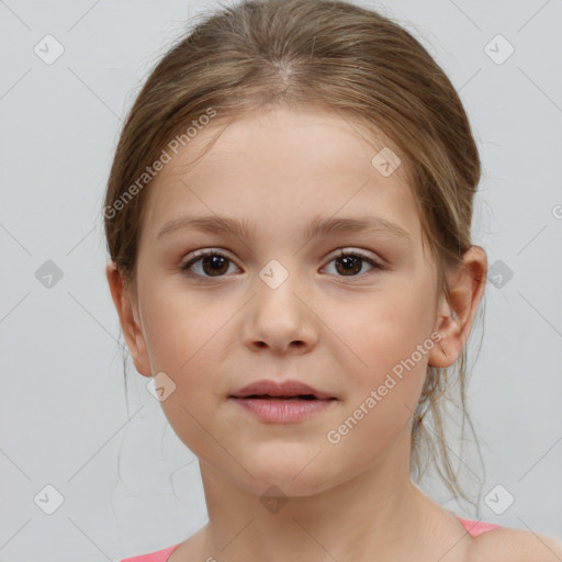 Joyful white child female with medium  brown hair and brown eyes