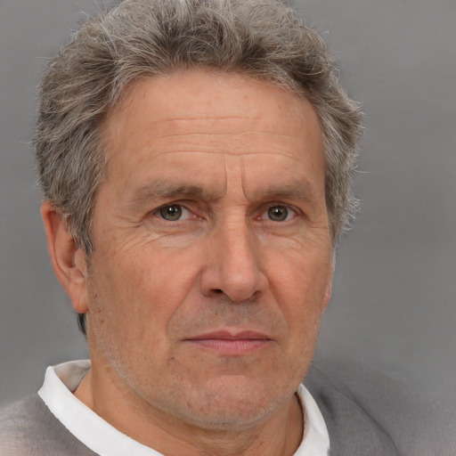 Neutral white middle-aged male with short  gray hair and brown eyes