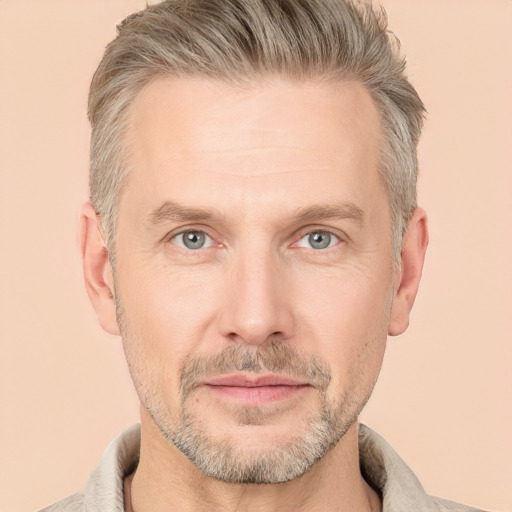 Neutral white adult male with short  blond hair and brown eyes