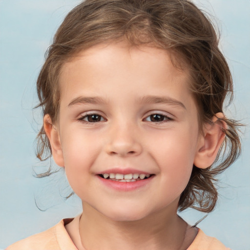 Joyful white child female with medium  brown hair and brown eyes