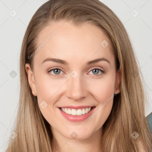 Joyful white young-adult female with long  brown hair and grey eyes