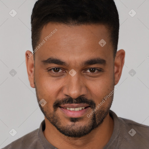 Joyful white young-adult male with short  brown hair and brown eyes