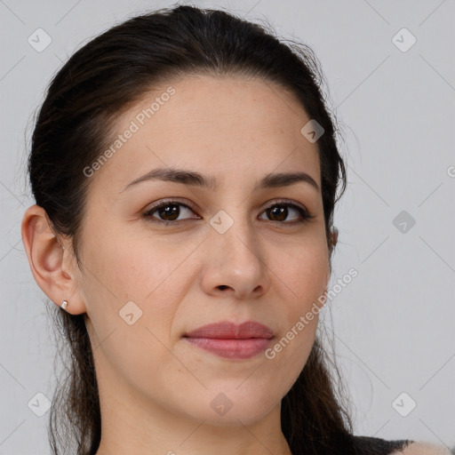 Joyful white young-adult female with long  brown hair and brown eyes