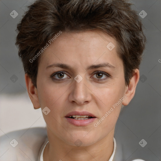 Joyful white adult female with short  brown hair and brown eyes