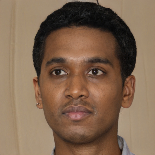 Neutral black young-adult male with short  black hair and brown eyes