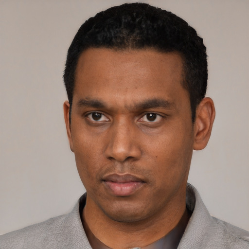 Neutral black young-adult male with short  black hair and brown eyes