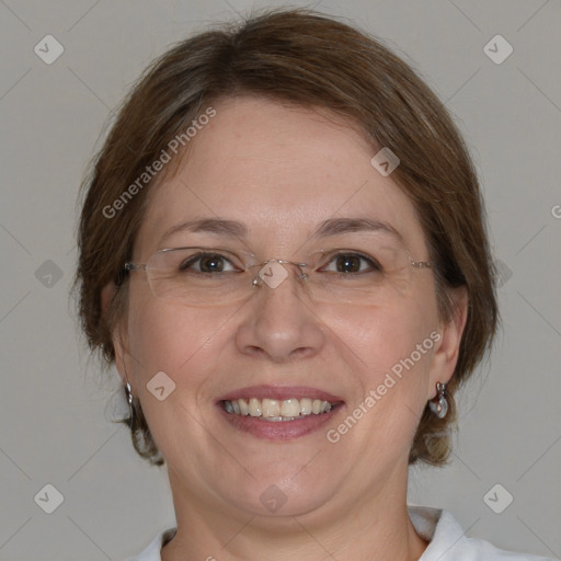 Joyful white adult female with medium  brown hair and blue eyes