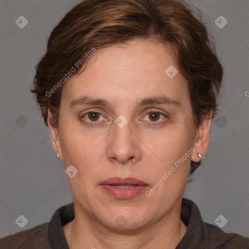 Joyful white adult female with medium  brown hair and grey eyes
