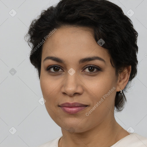 Joyful latino young-adult female with short  brown hair and brown eyes