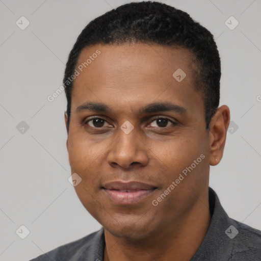 Joyful black young-adult male with short  black hair and brown eyes