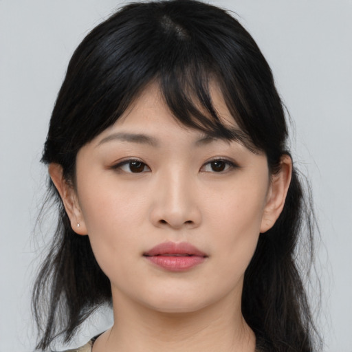 Neutral asian young-adult female with medium  brown hair and brown eyes