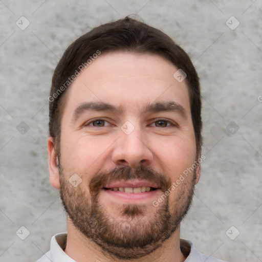 Joyful white young-adult male with short  brown hair and brown eyes