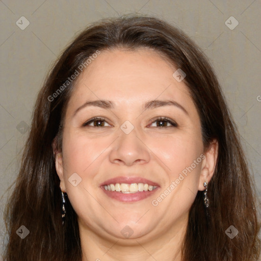 Joyful white adult female with long  brown hair and brown eyes