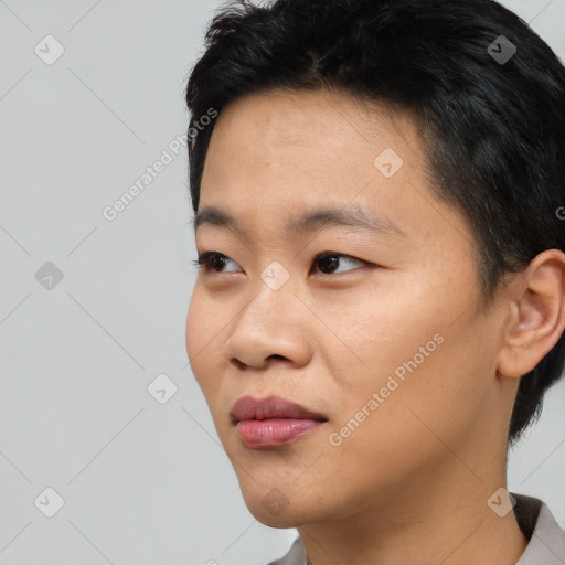 Joyful asian young-adult female with short  black hair and brown eyes