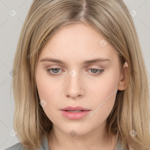 Neutral white young-adult female with long  brown hair and brown eyes