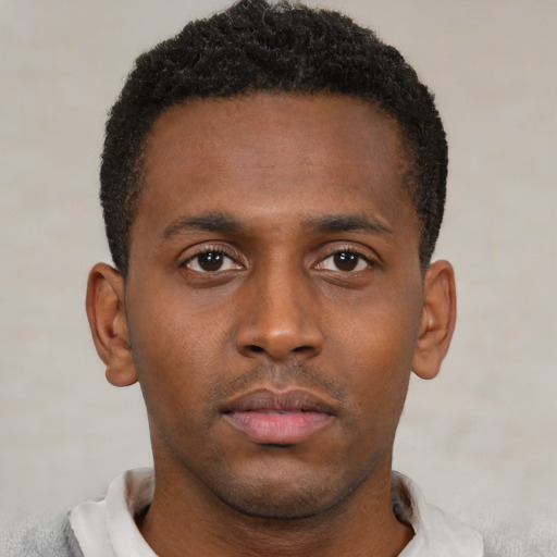 Neutral black young-adult male with short  brown hair and brown eyes