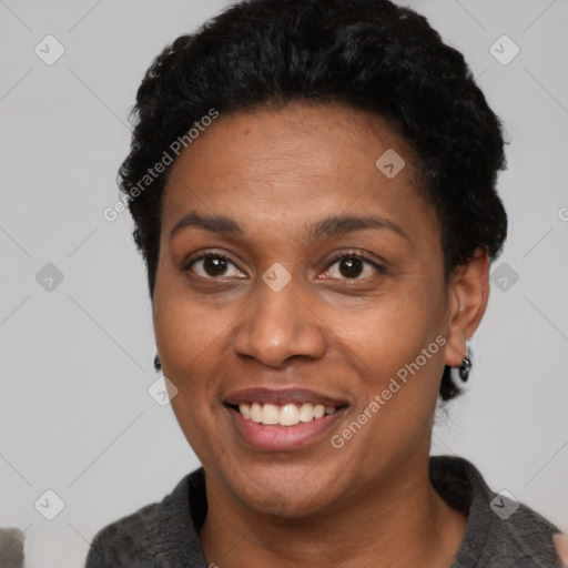 Joyful latino young-adult female with short  black hair and brown eyes