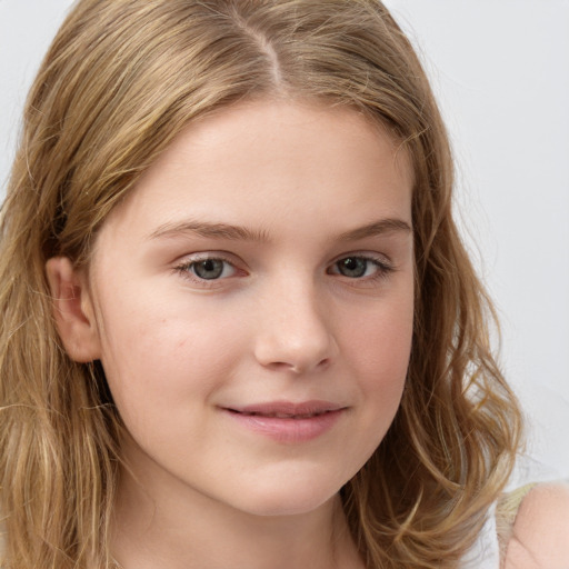 Joyful white child female with long  brown hair and grey eyes