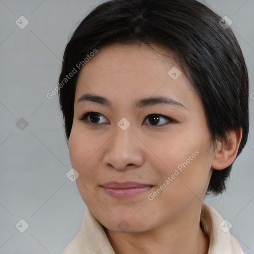 Joyful asian young-adult female with medium  brown hair and brown eyes