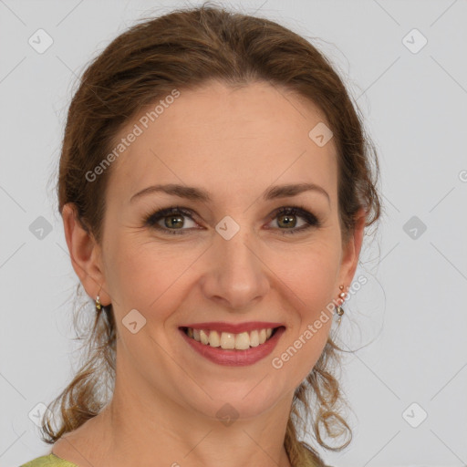 Joyful white young-adult female with long  brown hair and green eyes