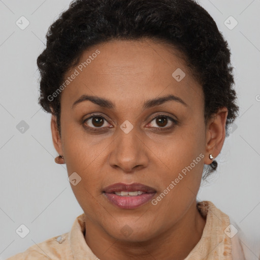 Joyful latino adult female with short  brown hair and brown eyes