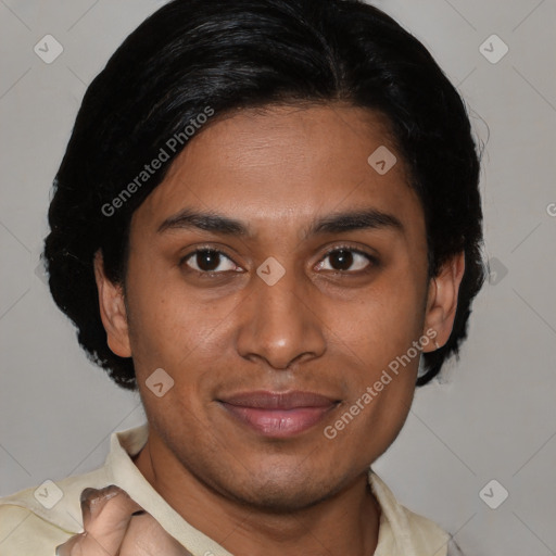 Joyful latino young-adult male with short  brown hair and brown eyes