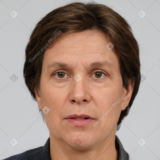 Joyful white adult female with short  brown hair and grey eyes