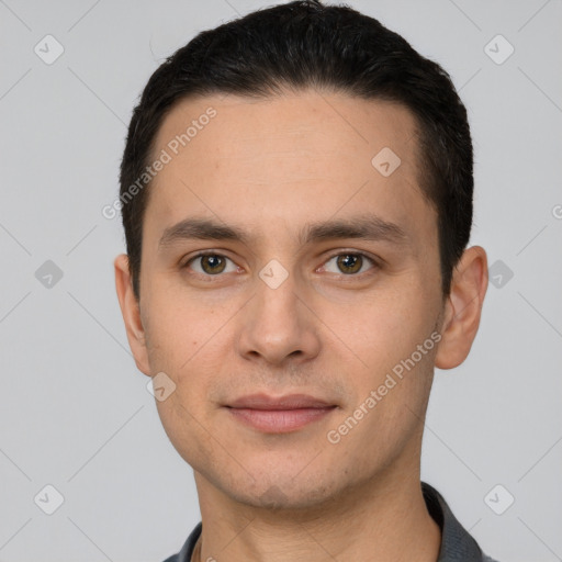 Joyful white young-adult male with short  brown hair and brown eyes