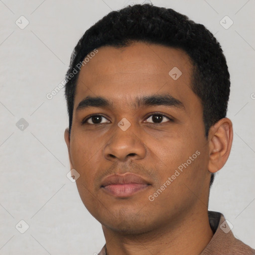 Neutral black young-adult male with short  black hair and brown eyes