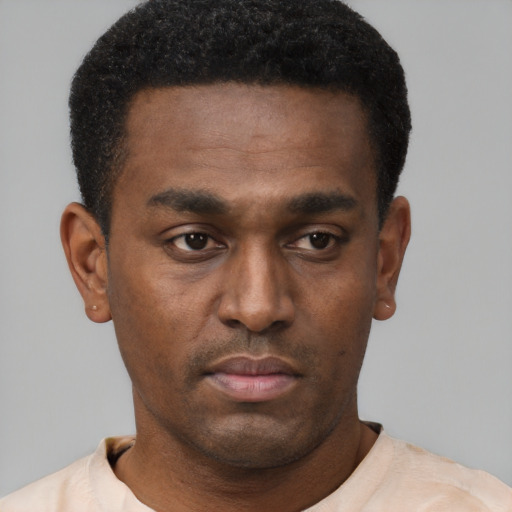 Neutral black young-adult male with short  black hair and brown eyes