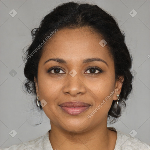 Joyful black adult female with medium  brown hair and brown eyes