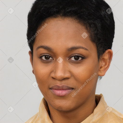 Joyful black young-adult female with short  brown hair and brown eyes